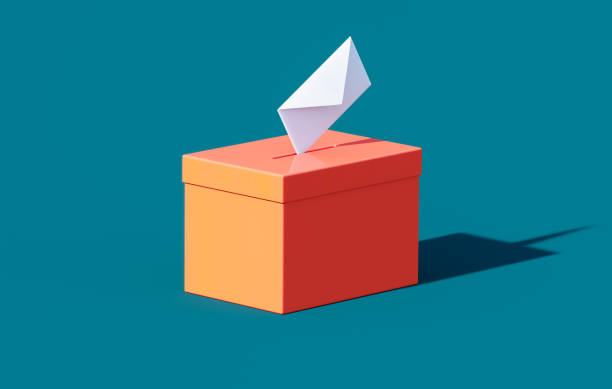 istock Orange Colored Ballot Box On Blue Background 2156034377