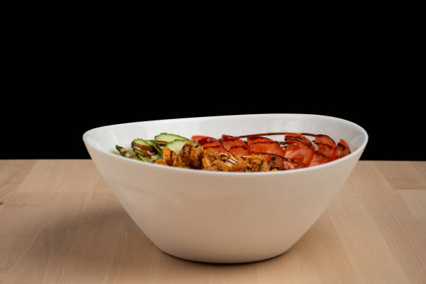 istock Mixed salad with various ingredients and meat in a bowl 2156041441