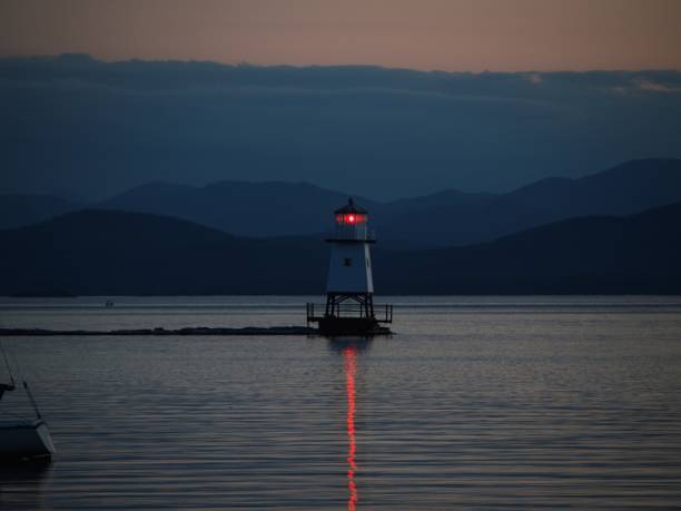 istock Burlington Breakwater Lights right after the sun set over the Adirondacks 2156053797