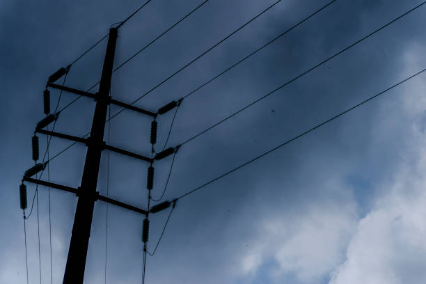 istock there are three wires on a pole near some clouds on a cloudy day 2156054839