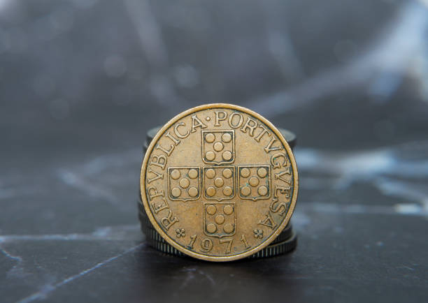 istock Portugese centavo coin stacked on a table in a neat pile 2156054928