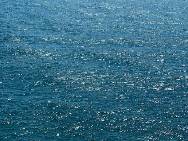 istock Blue water surface, calm sea shiny aqua. 2156056244