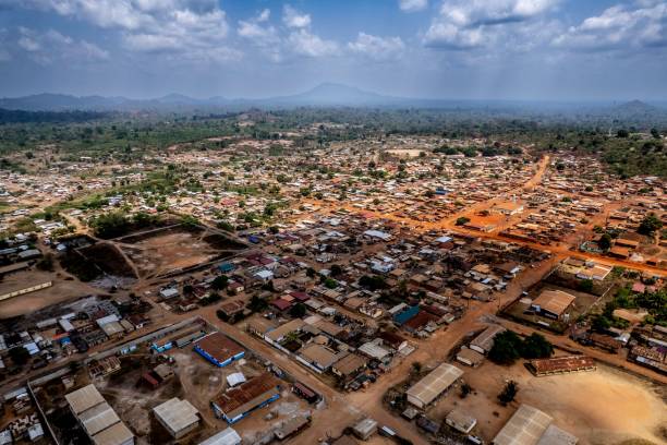 istock Aerial view of buildings with distant mountains as a backdrop 2156056925