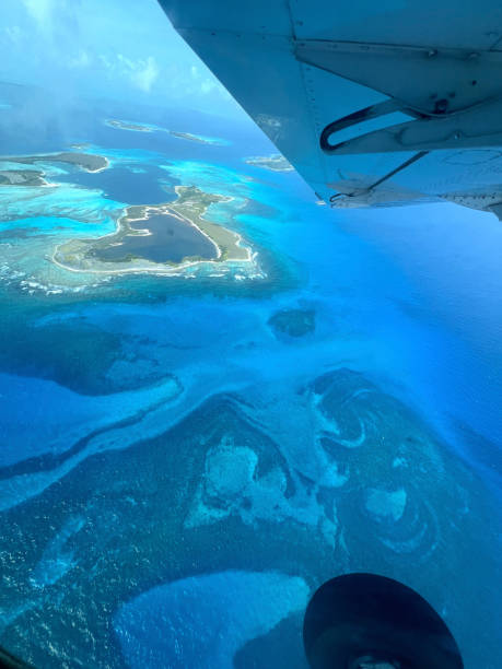 istock View of ocean from airplane in flight 2156057090