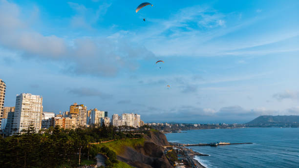 istock Lima Peru Beach Coast and Paragliding in Sunset 2156058301