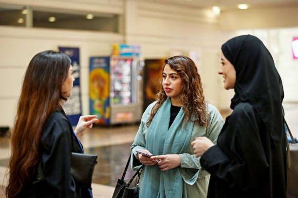 istock Young female students discussing in university 2156059080