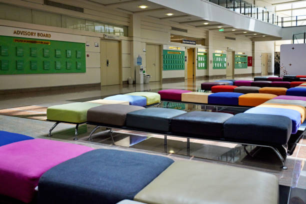 Colorful empty seats arranged in university lobby