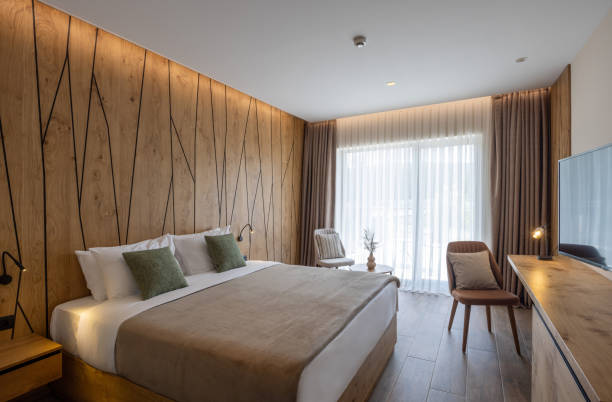 istock Interior of a hotel apartment with large master bed 2156059634