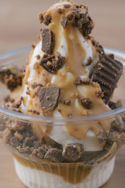 istock Sundae Ice cream with chocolate and nuts topping 2156059733