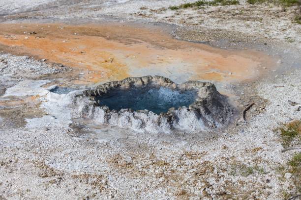 istock Natural geyser pool in geothermal valley 2156059893
