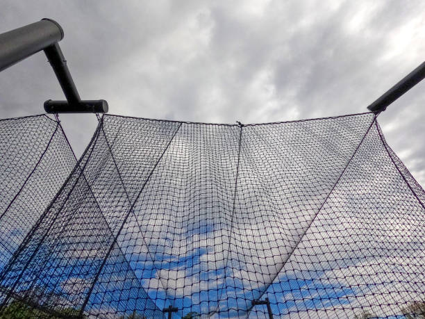 istock Sports Nets Against a Cloudy Blue Sky 2156062198