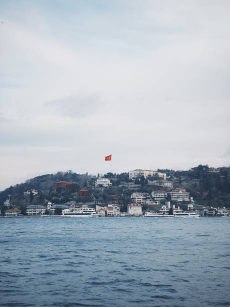 istock Turkish flag adorns a boat on water 2156063059