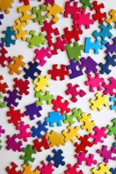 istock Colorful Jigsaw Puzzle Pieces 2156063194