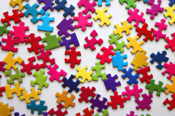 istock Colorful Jigsaw Puzzle Pieces 2156063218