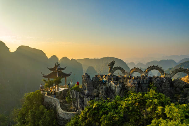 istock Stunning Asian mountain landscape with a pagoda atop 2156063405