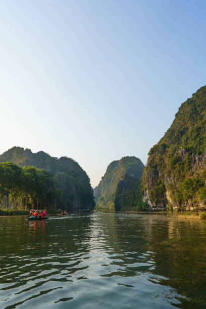 istock people kayaking down the river near a mountainous mountainside 2156063443
