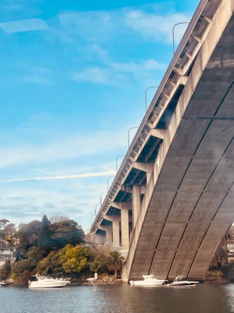 istock Boat passing under Gladesville Bridge in Sydney 2156064187
