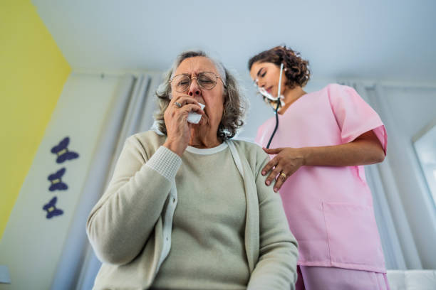 istock Doctor examining a senior woman at nursing home 2156064458
