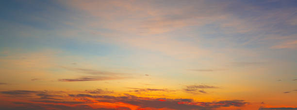 istock Clouds and sky in the evening,Real majestic sunrise sundown sky background with gentle colorful clouds without birds. Panoramic, big size 2156064681
