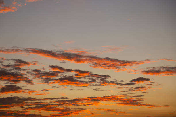 Bela Vista, Goias, Brazil – May 10, 2023:  Detail of a beautiful sky with orange late afternoon light.