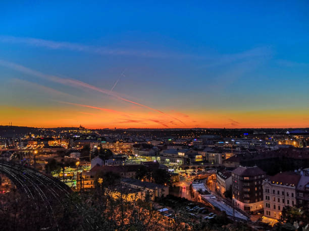 istock Vibrant cityscape sunset viewed from a rooftop 2156067031