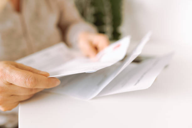 istock woman's hands holding an envelope with a letter 2156071608
