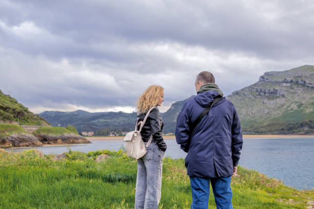 istock Couple walking in seaside 2156071657
