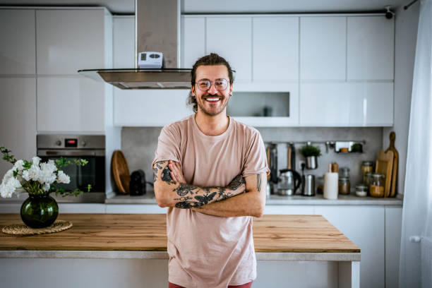 istock Young smiling man at home 2156072783