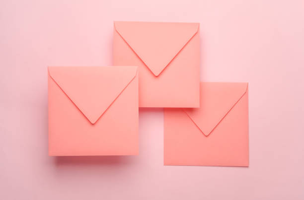 istock Square paper pink envelopes on pink background 2156072954