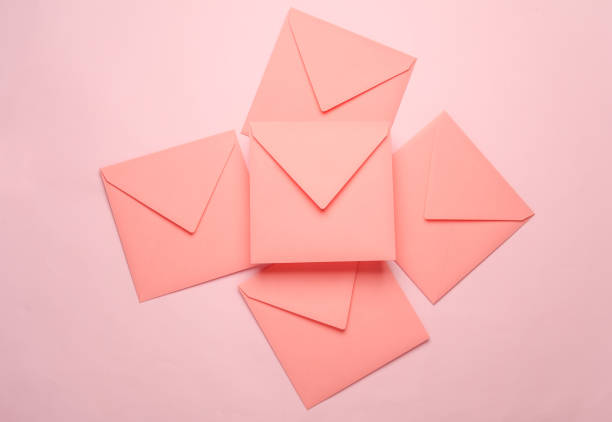 istock Square paper pink envelopes on pink background 2156072957
