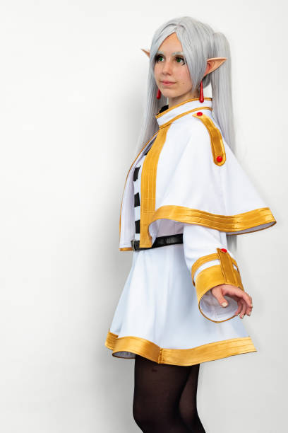 istock Female cosplayer dressed as an elf character with white hair on a white background 2156073506