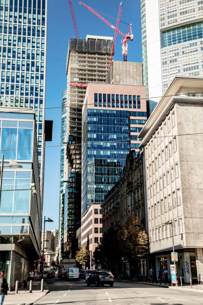 Frankfurt, Germany 27 september 2018. Omniturm Tower and Grosse Gallusstrasse Street at Bankenviertel business district - Frankfurt, Germany. tall modern blue skyscrapers with large glass
