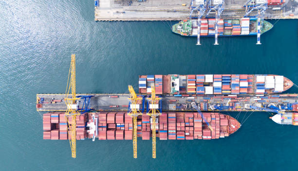 istock Aerial top view of container ship in a container terminal port. 2156077870