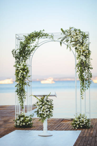 istock Beautiful wedding arch on the beach 2156081301