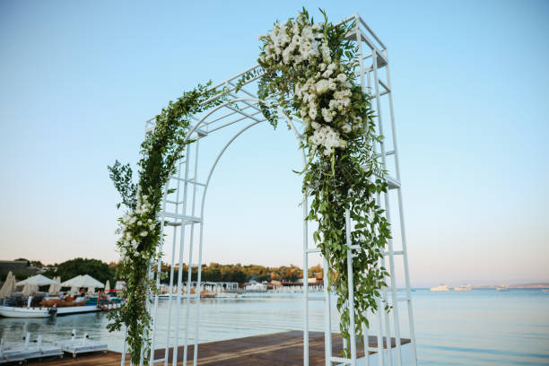 istock Beautiful wedding arch on the beach 2156081354