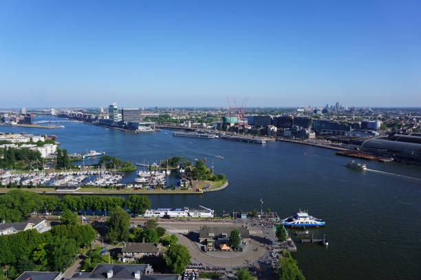 istock High angle view of river and buildings against clear blue sky 2156083156