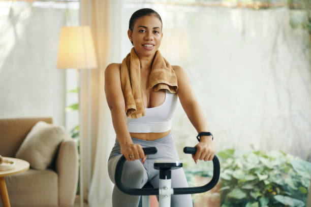 istock Woman Resting on Exercise Bike 2156083782