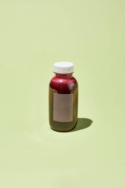 istock Berry Smoothie Bottle with Currant in Pastel Minimalist Creative Concept 2156088131