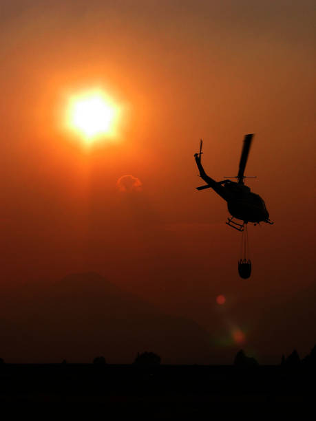 istock Smoky Afternoon Sun Helicopter Launch 2156088429