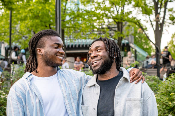 istock Close Friends: Black Canadian Men Embrace in Downtown Winnipeg 2156090850