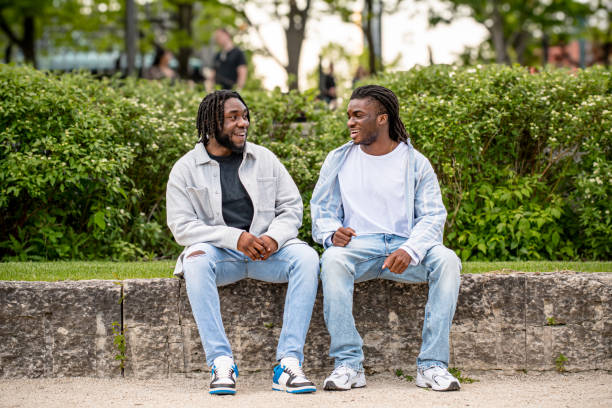 istock Downtown Dialogue: Young Black Men Chatting in Winnipeg 2156090946