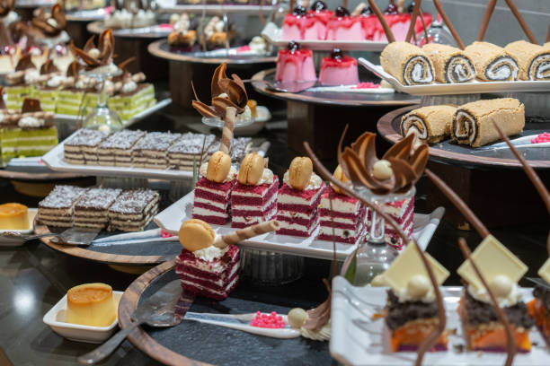 istock Gourmet sweet pastries on stall, different cakes and sweets. 2156092359