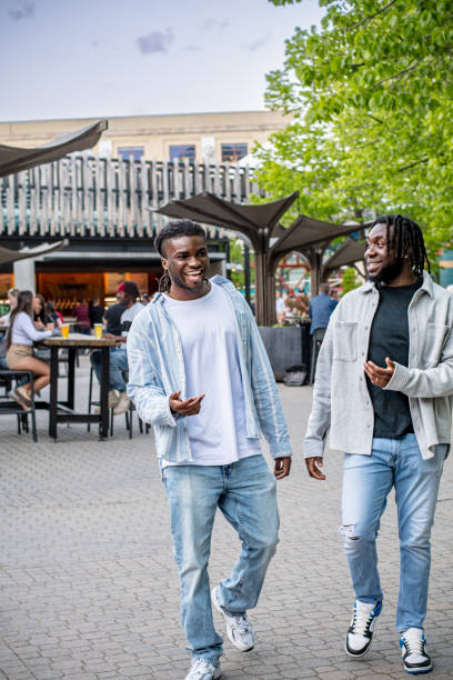 istock Walking and Talking: Young Black Men Departing in Winnipeg 2156092426