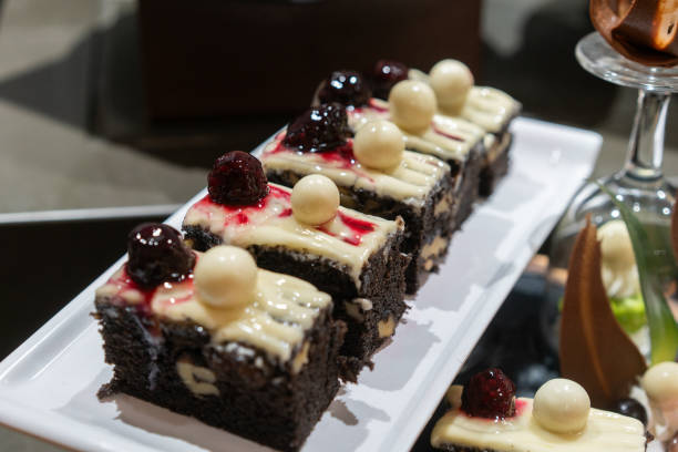 istock Gourmet sweet pastries on stall, different cakes and sweets. 2156092543