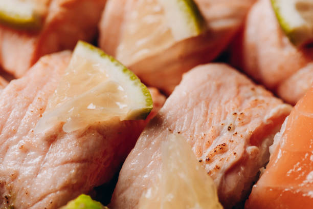 Delicious roll with salmon, juicy fresh roll with lime