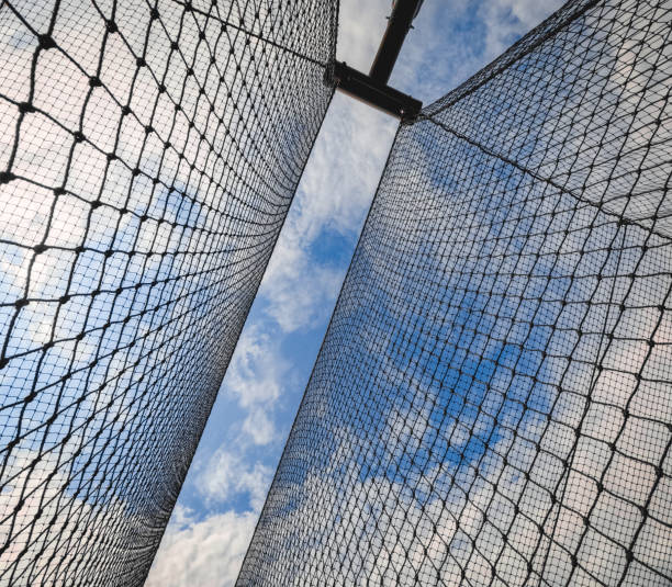 istock Sports Nets Against a Cloudy Blue Sky 2156100433