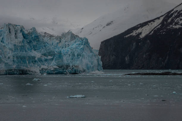 The beginning of a large cleaving of the end of the Hubbard Glacier in Alaska. First of a series of images of the ice falling in the water off the glacier.