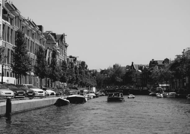 istock a small boat in a canal in the city 2156110437