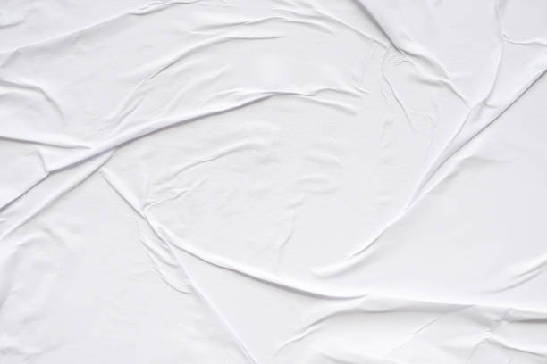 istock White blank crumpled and creased paper poster texture background 2156113518