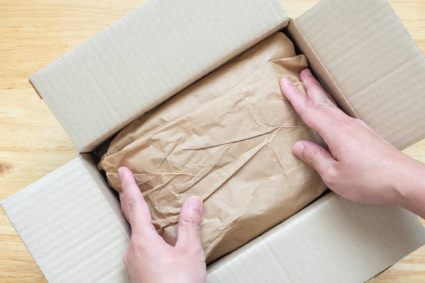 istock Eco friendly brown paper honeycomb wrap for product packaging parcel carton box 2156113668